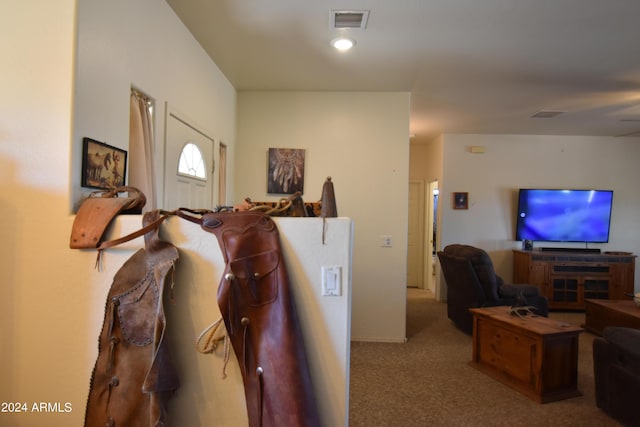 hallway with light carpet