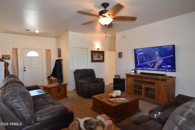 living room with carpet floors and ceiling fan