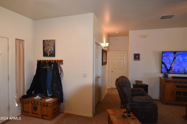 living room with light colored carpet