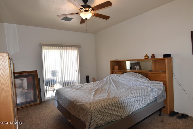 carpeted bedroom with ceiling fan and access to outside