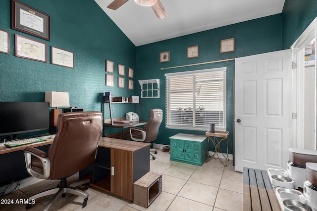 tiled office with vaulted ceiling and ceiling fan