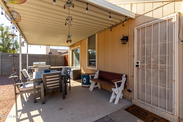 view of patio / terrace featuring a grill and an outdoor hangout area