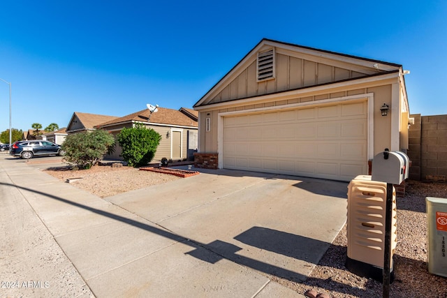 ranch-style house featuring a garage