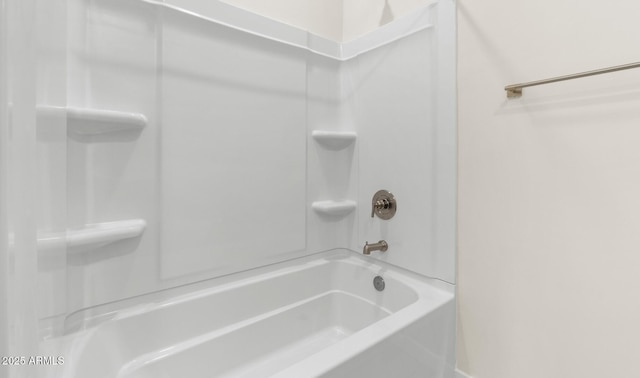 bathroom featuring washtub / shower combination