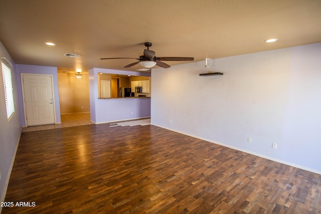 44944 W Miramar Rd, Maricopa, AZ 85139 - unfurnished living room featuring wood finished floors, ceiling fan, baseboards, and recessed lighting