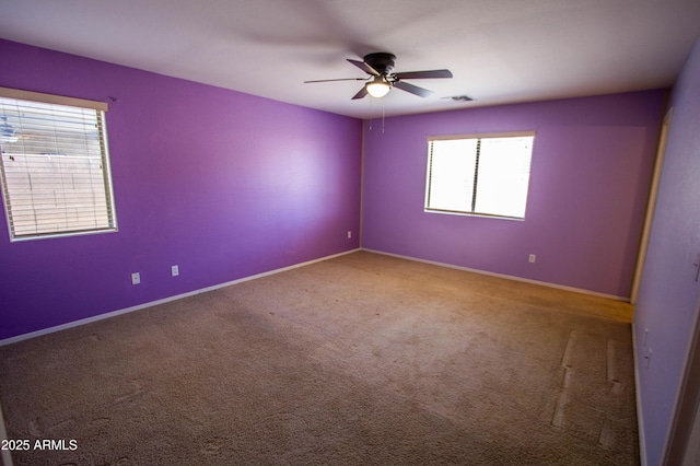 44944 W Miramar Rd, Maricopa, AZ 85139 - carpeted empty room with ceiling fan and baseboards
