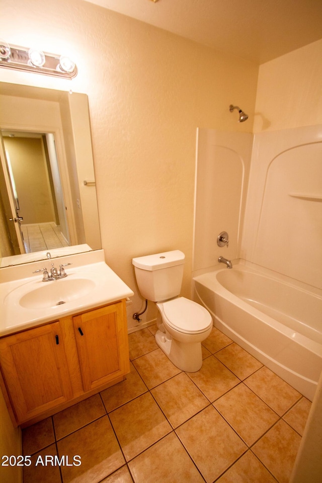 44944 W Miramar Rd, Maricopa, AZ 85139 - full bathroom with toilet, washtub / shower combination, tile patterned flooring, and vanity