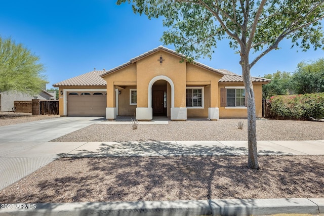 19617 S 190th St, Queen Creek, AZ 85142 - mediterranean / spanish house with stucco siding, a garage, a tile roof, driveway, and fence
