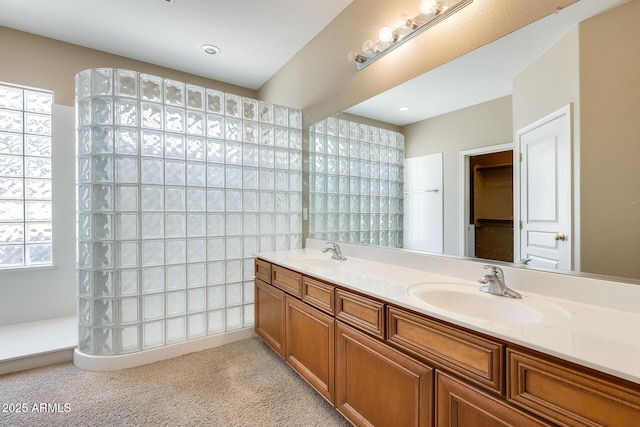 19617 S 190th St, Queen Creek, AZ 85142 - bathroom featuring walk in shower, double vanity, and healthy amount of natural light
