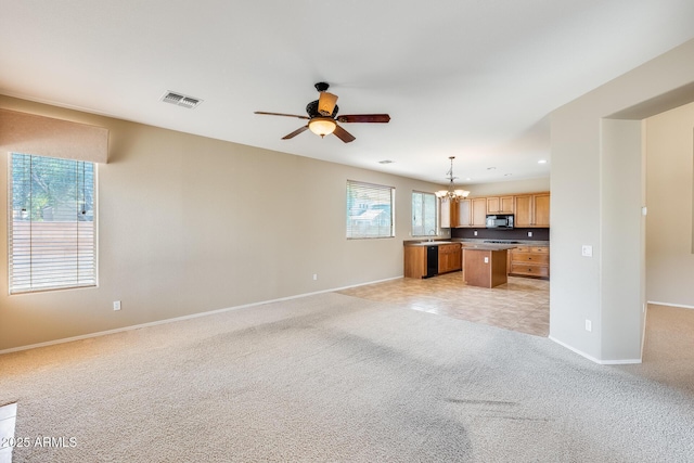19617 S 190th St, Queen Creek, AZ 85142 - unfurnished living room with a chandelier, baseboards, light colored carpet, and recessed lighting