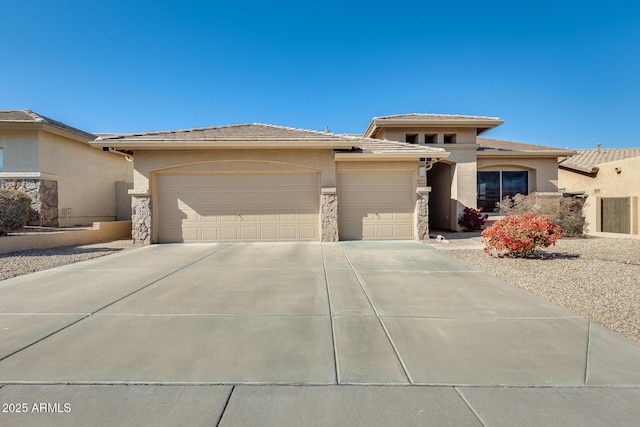 prairie-style house featuring a garage