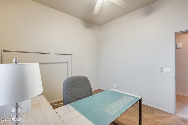 office area featuring ceiling fan and carpet