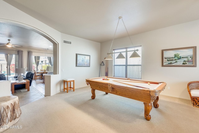 recreation room with light colored carpet, ceiling fan, and billiards