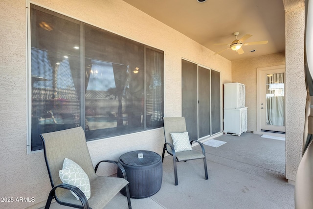 view of patio / terrace with ceiling fan