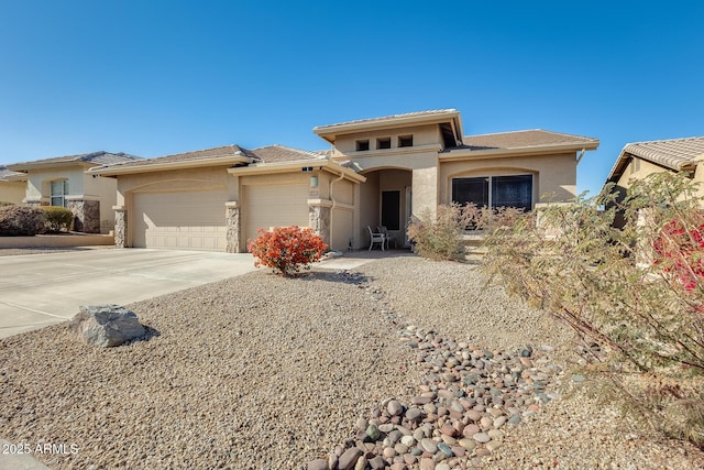 prairie-style home with a garage