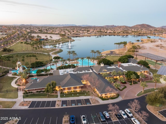 bird's eye view featuring a water and mountain view