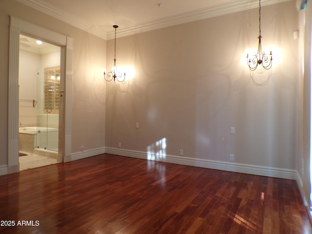 unfurnished dining area featuring hardwood / wood-style floors, crown molding, and a notable chandelier