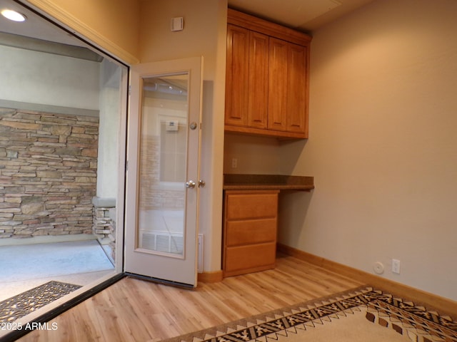 doorway to outside with light hardwood / wood-style flooring