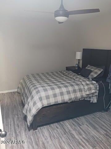 5539 N 31st Ln, Phoenix, AZ 85017 - bedroom with wood finished floors and baseboards