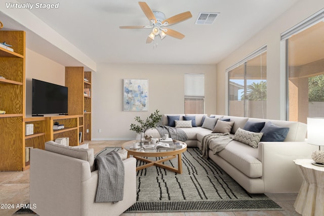 living room with ceiling fan