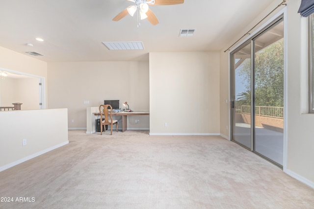 interior space featuring ceiling fan