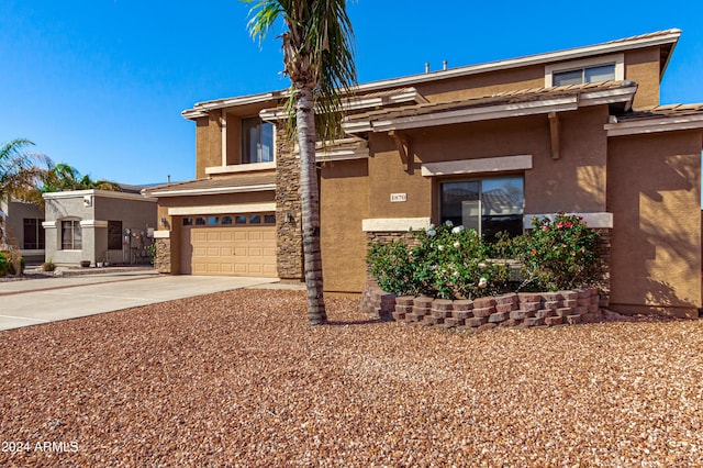 view of front of home with a garage