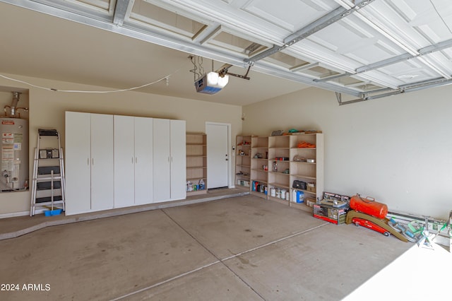 garage featuring a garage door opener and gas water heater