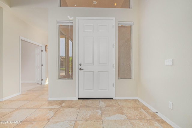 interior space with light tile patterned floors