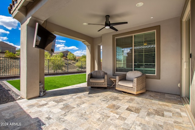 view of patio with ceiling fan