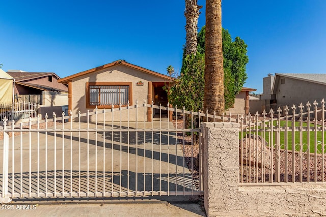 5649 W Holly St, Phoenix, AZ 85035 - view of front of home featuring a fenced front yard and stucco siding
