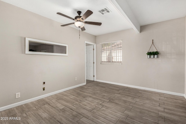 5649 W Holly St, Phoenix, AZ 85035 - empty room featuring a ceiling fan and wood finished floors