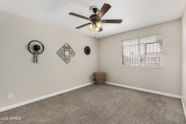 5649 W Holly St, Phoenix, AZ 85035 - carpeted spare room with ceiling fan and baseboards