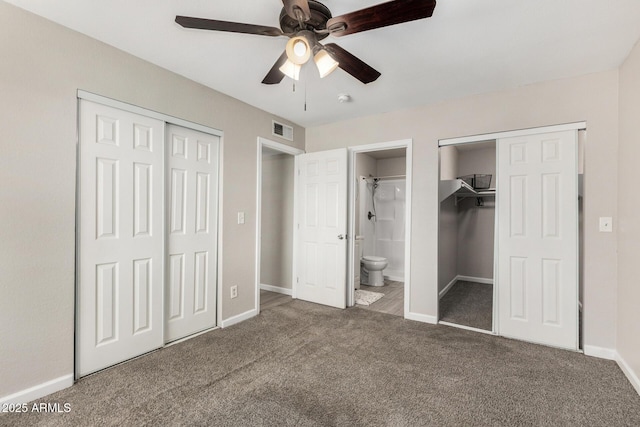 5649 W Holly St, Phoenix, AZ 85035 - unfurnished bedroom with carpet flooring, ensuite bath, and a ceiling fan