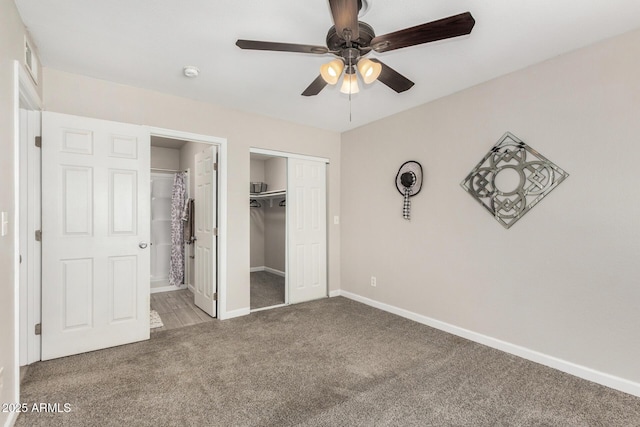 5649 W Holly St, Phoenix, AZ 85035 - unfurnished bedroom featuring carpet flooring, a closet, connected bathroom, and a ceiling fan