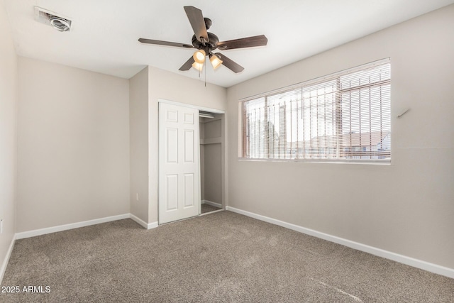 5649 W Holly St, Phoenix, AZ 85035 - unfurnished bedroom with carpet, a closet, and ceiling fan