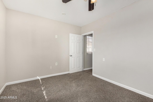 5649 W Holly St, Phoenix, AZ 85035 - spare room featuring ceiling fan and carpet