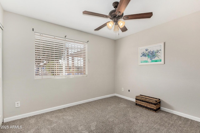 5649 W Holly St, Phoenix, AZ 85035 - carpeted spare room featuring ceiling fan and baseboards