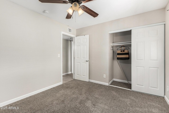 5649 W Holly St, Phoenix, AZ 85035 - unfurnished bedroom with carpet, a closet, and a ceiling fan