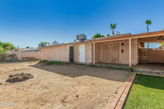 5649 W Holly St, Phoenix, AZ 85035 - rear view of property with stucco siding