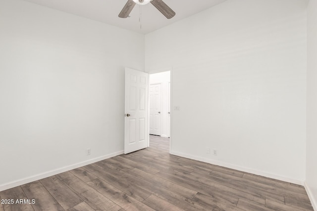 8648 W Fargo Dr, Peoria, AZ 85382 - empty room with baseboards, wood finished floors, and ceiling fan