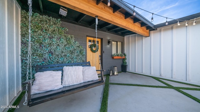 doorway to property with a patio