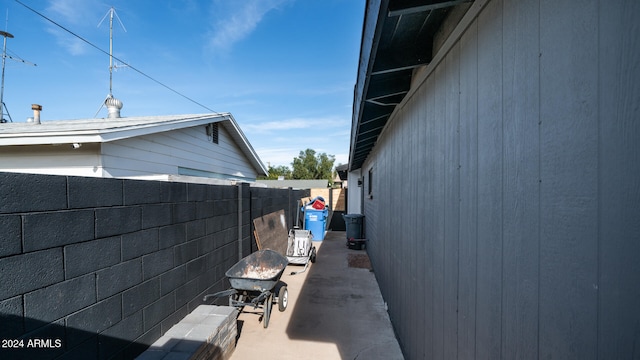 view of side of property with a patio area