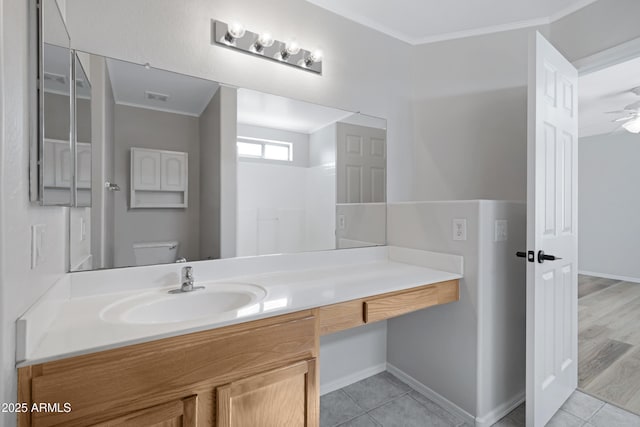 bathroom with visible vents, crown molding, tile patterned flooring, vanity, and toilet