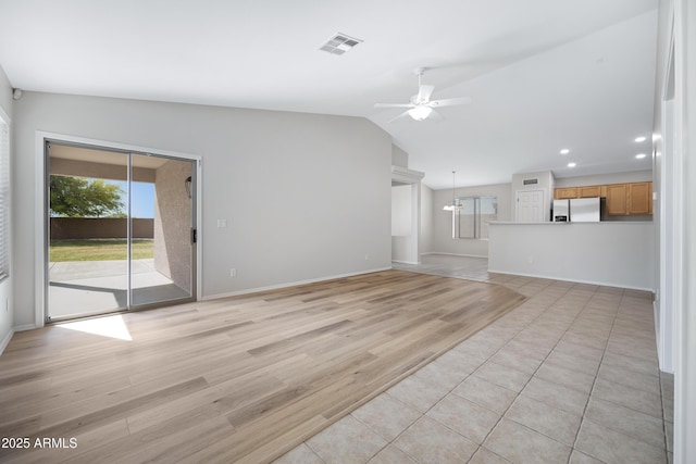 unfurnished living room featuring visible vents, baseboards, ceiling fan, recessed lighting, and vaulted ceiling
