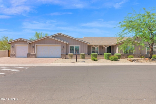1336 E Belmont Ave, Phoenix, AZ 85020 - ranch-style home featuring an attached garage, driveway, and a tiled roof