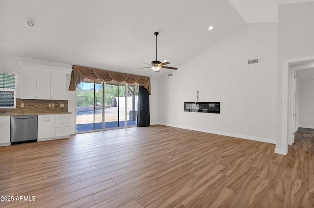 1336 E Belmont Ave, Phoenix, AZ 85020 - unfurnished living room with a ceiling fan, light wood-style floors, high vaulted ceiling, and recessed lighting