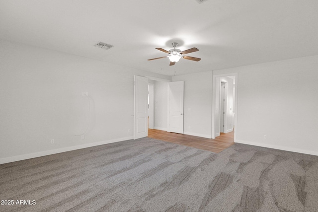 1336 E Belmont Ave, Phoenix, AZ 85020 - unfurnished bedroom featuring carpet floors and ceiling fan