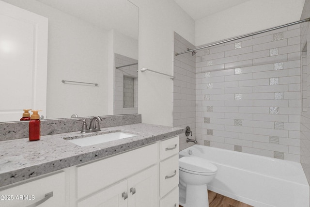 1336 E Belmont Ave, Phoenix, AZ 85020 - full bathroom with vanity, bathtub / shower combination, and wood finished floors