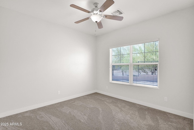 1336 E Belmont Ave, Phoenix, AZ 85020 - empty room with carpet floors and a ceiling fan