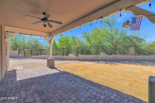 1336 E Belmont Ave, Phoenix, AZ 85020 - fenced backyard with a ceiling fan and a patio